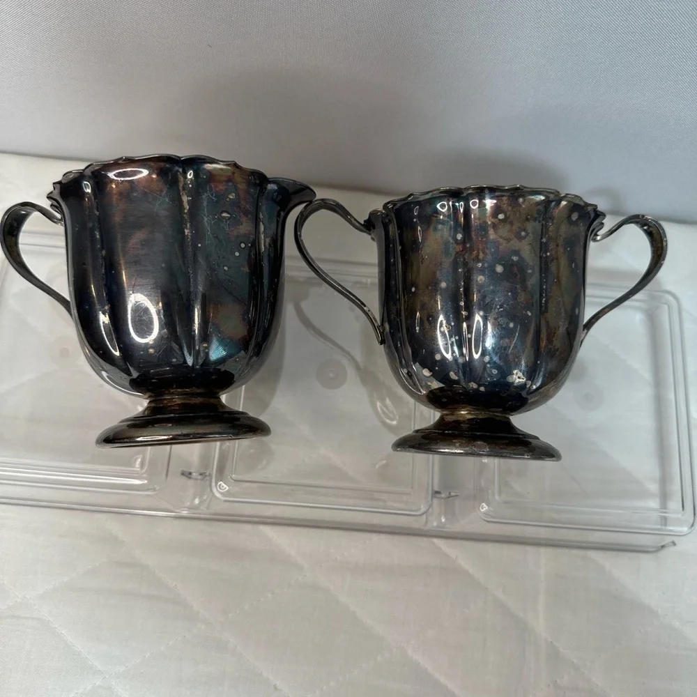 I gave Early American International Company Sugar And Cream Set Silver Plated
